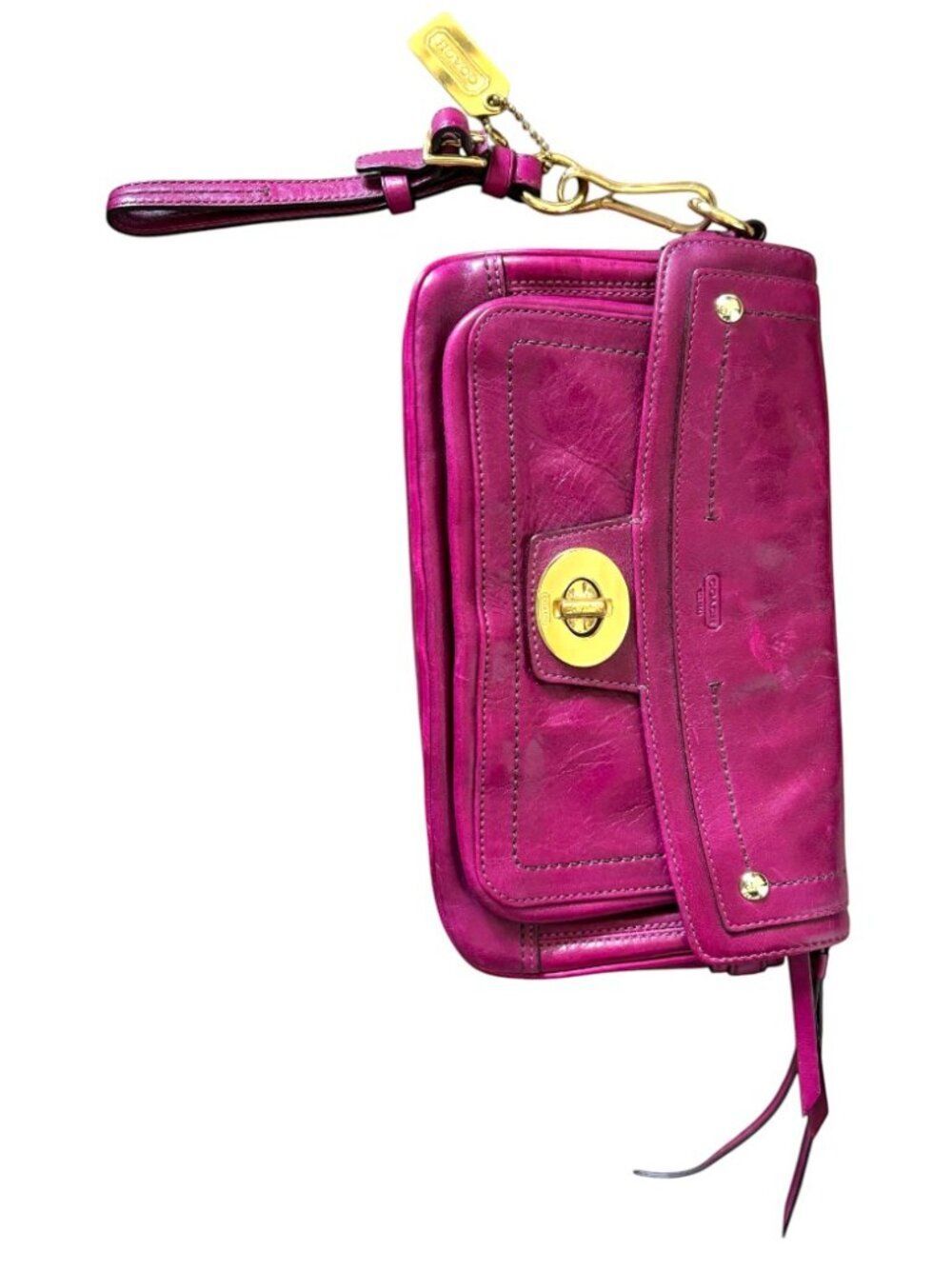 Coach, 6in x 11 in x1.25 inches Hampton Lindsey Magenta Leather Turn Lock Clutch